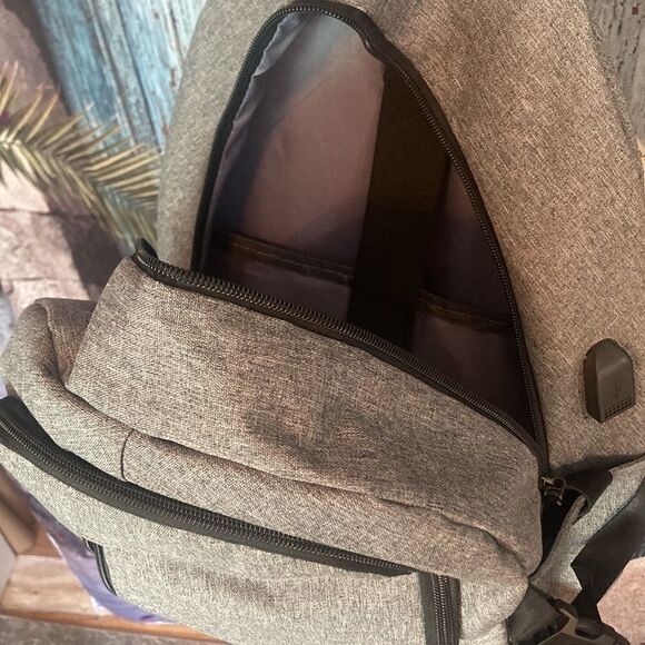 No brand grey and black backpack , has many pockets and zippers , EUC - Picture 4 of 11